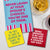 top view photo of tea towel coaster and napkin with general humor printed.